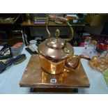 Interesting copper food warmer and a copper kettle