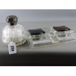 Hobnail cut salts bottle with silver lid and interior stopper (hinge requiring attention) and a