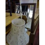 Onyx and brass standard lamp with shade and a dark wood framed mirror E/T