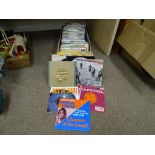 Box of 45rpm records including Ace of Bass, Barry White, Don Maclean and similar era