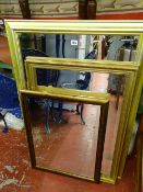 Three gilt framed wall mirrors