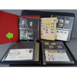 Four album collection of approximately 150 first day covers, most with matching mint unused