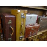 Five pieces of vintage luggage