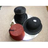Bowler hat, a fez and a top hat by Best Quality of London and a vintage wall mirror