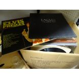 Box of LP records, various genres including The Eagles, Elvis Presley etc