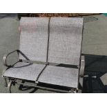 Two seater swinging garden seat