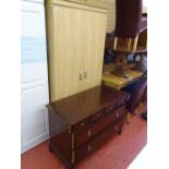 Stag Minstrel multi-drawer chest and a light wood effect two door wardrobe