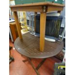 Two wooden garden tables and two garden recliners