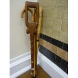 Bundle of walking sticks and a 'Big Stinger' baseball bat