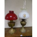 Two brass oil lamps and two good shades