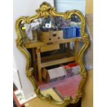 Ornate gilt framed wall mirror