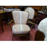 Mid Century Ercol armchair and a similar rocking chair