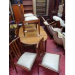 Teak mid Century extending dining table (with swing insert leaf) and a set of six chairs