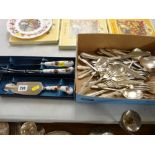 Boxed Royal Worcester serving cutlery and a parcel of flatware