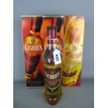 Four boxed and one unboxed bottles of Grants Family Reserve Whisky