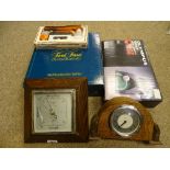 Neat Enfield polished mantel clock and a barometer with a quantity of board games etc