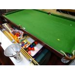 Snooker table on stand with accessories