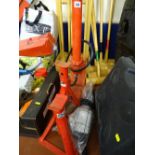 Pair of red axle stands, hand pump etc