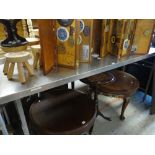 A metal commercial-kitchen preparation table with rail top, 202cms wide Condition reports provided