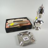 Silver square ashtray together with silver pierced castor and cased vanity brush, all Birmingham