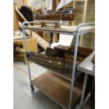 A good vintage 'industrial look' three shelf trolley, 91cms wide x 129cms high Condition reports