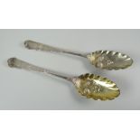 Two silver engraved berry spoons, late eighteenth / early nineteenth century, rubbed hallmarks