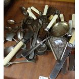 Tray of assorted plated cutlery including slices, various spoons and knives Condition reports