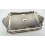 A silver twin-handled liquor tray with beaded border, Sheffield 1939, 27ozs Condition reports