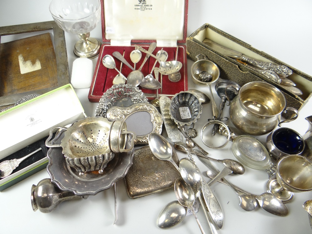 Box of assorted silver and silver plate to include strainer, photograph frame, loose cutlery,