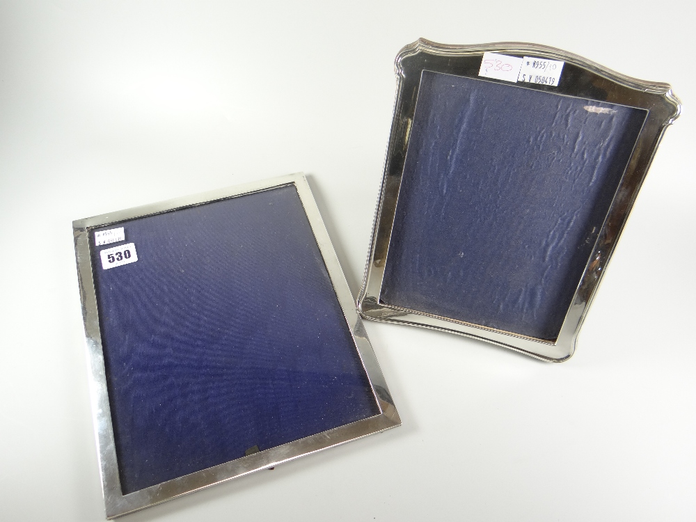 Two similar silver rectangular photograph frames, mixed hallmarks Condition reports provided on