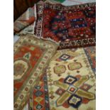 An excellent parcel of five various patterned Persian woollen rugs Condition reports provided on