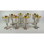 A set of eight Elizabeth II silver goblets with gilt interiors and knopped stems, London 1971, 39ozs