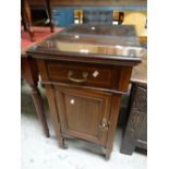 A vintage inlaid mahogany cabinet on castors with cupboard and single drawer Condition reports