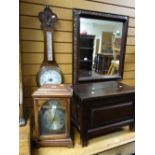 A simple panelled stained wooden box, a reproduction mantel clock with battery operation and an