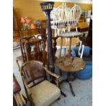 A circular top tripod table, a tapestry top tripod table, an antique torchiere and a cane back chair