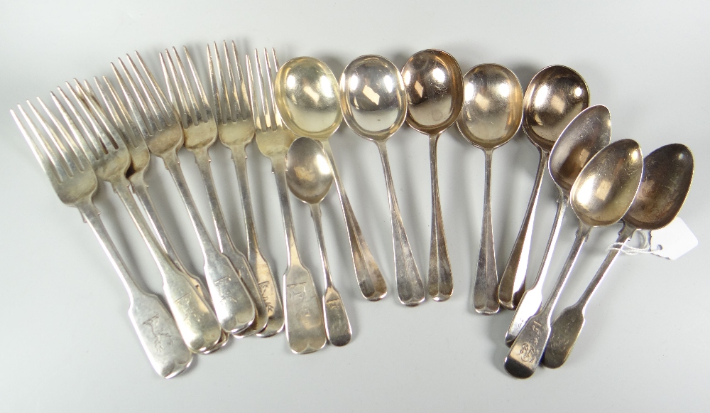 A parcel of silver forks and spoons with engraved crests to the terminals, 21ozs (together with five