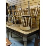 A rustic pine breakfast table with drawer and 4+1 spindle back chairs, 148 x 89cms Condition reports