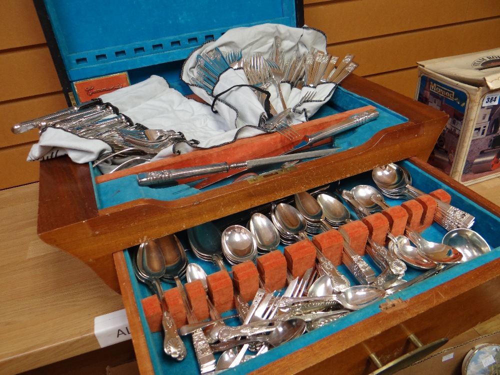 A substantial mid-century community cutlery canteen with mixed contents of Walker & Hall EPNS Queens