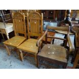 An antique farmhouse elbow chair and a pair of pine chairs with carved lunette backs Condition
