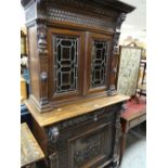 A late nineteenth century carved oak Low-countries type kitchen-dresser of narrow proportions,