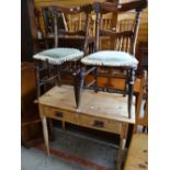 A stripped pine two-drawer side table and a pair of carved chairs Condition reports provided on