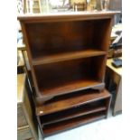 A mahogany two-shelf open bookcase on bracket feet, 78cms wide and a modern rosewood TV cabinet