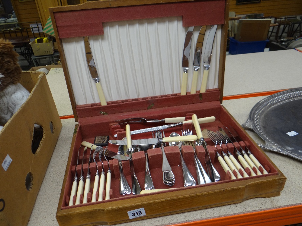 Cased wooden canteen of Sheffield cutlery Condition reports provided on request by email for this