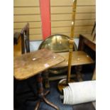 A rounded rectangular top occasional table on turned and spider supports, a mahogany standard lamp &