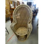 A retro cane work peacock-type chair Condition reports provided on request by email for this auction