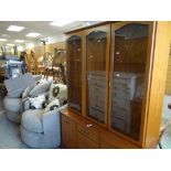 A modern bookcase cupboard with etched glass top, 131cms wide, together with an as new lounge