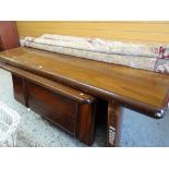 A large mid-century draughtsman's hardwood office corner desk with three hidden drawers, the