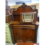 Large raised back sideboard with moulded surround and shelf on bobbin supports and with drawer and