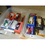 Two tubs of boxed diecast vehicles Condition reports provided on request by email for this auction