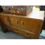 A vintage / mid-century oak sideboard unit having a combination of single drawer and cupboards